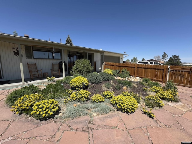 302 Clearview St, Saratoga, WY 82331 - rear view of property with a ceiling fan
