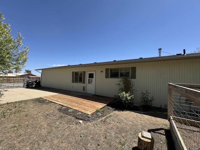 302 Clearview St, Saratoga, WY 82331 - back of house featuring a deck