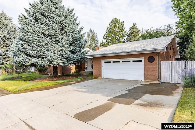 1823 Walnut St, Rock Springs, WY 82901 - garage with concrete driveway