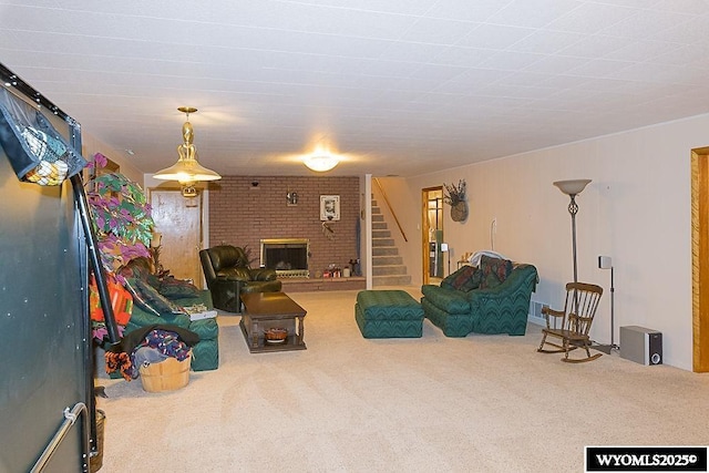 1823 Walnut St, Rock Springs, WY 82901 - living room with stairway, carpet, and a brick fireplace