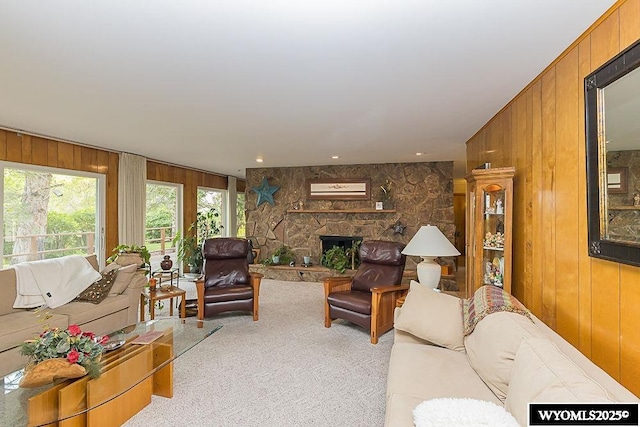 1823 Walnut St, Rock Springs, WY 82901 - living room featuring wood walls, carpet, and a fireplace