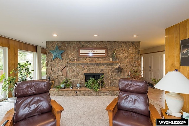 1823 Walnut St, Rock Springs, WY 82901 - living area with wood walls and a fireplace