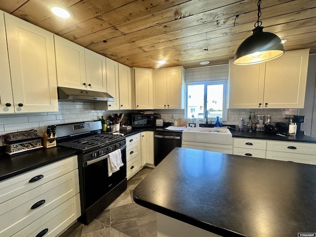 1023Pine Ave, Kemmerer, WY 83101 - kitchen featuring under cabinet range hood, black gas range, wood ceiling, dishwashing machine, and dark countertops