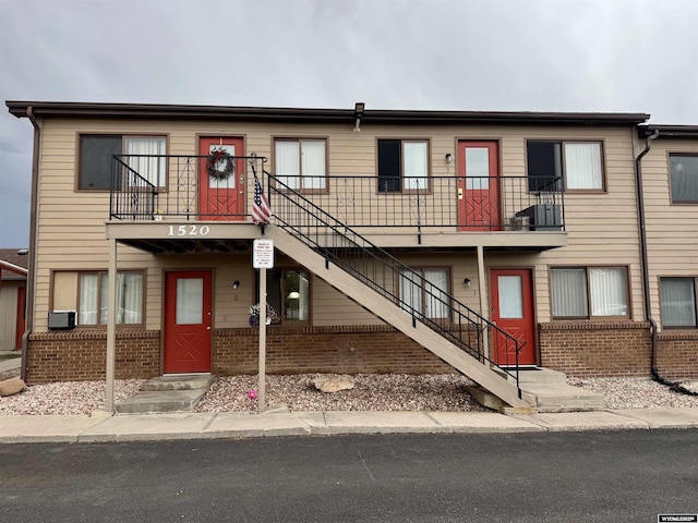 1520 Palmer Dr, Laramie, WY 82070 - view of building exterior featuring stairway