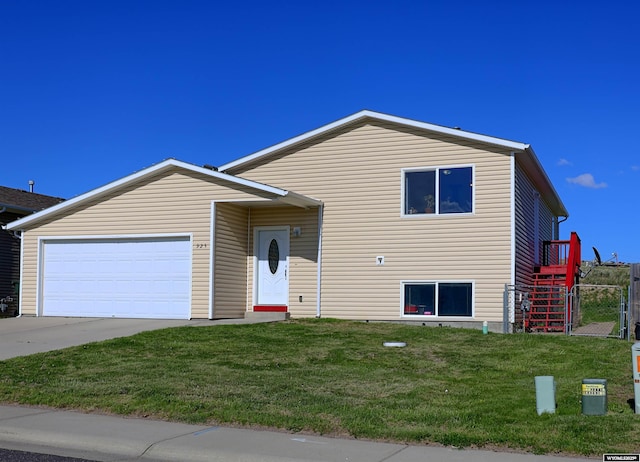 925 Skyline Dr, Douglas, WY 82633 - split level home with driveway and an attached garage