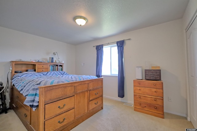 925 Skyline Dr, Douglas, WY 82633 - bedroom with light colored carpet and baseboards