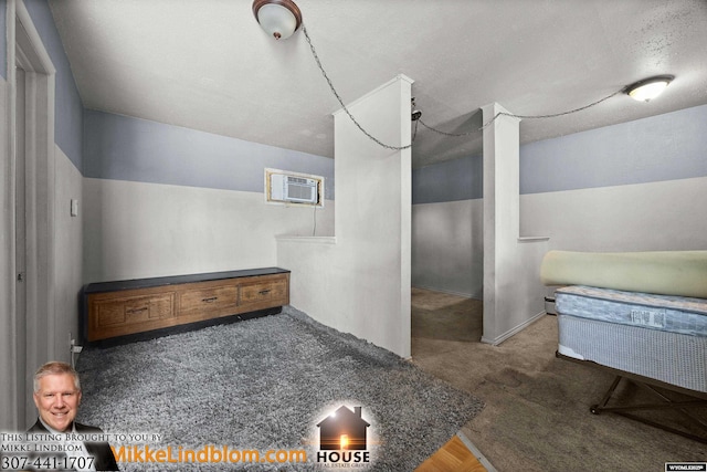 830EASTREET E A St, Casper, WY 82601 - bathroom with a wall mounted AC and a textured ceiling