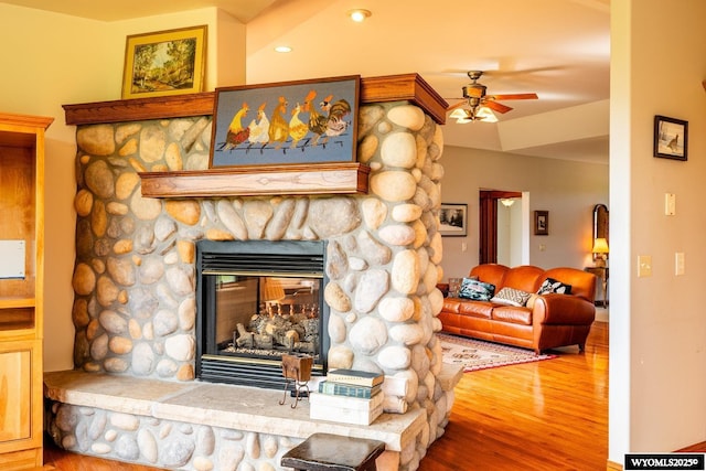 22 Pleasant Valley Ln, Sheridan, WY 82801 - detailed view of wood finished floors, ceiling fan, and a fireplace