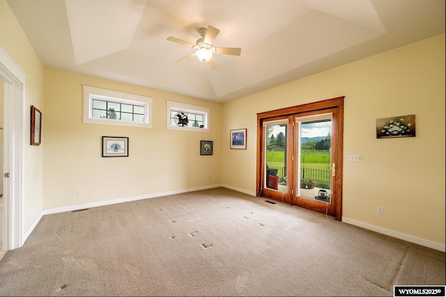 22 Pleasant Valley Ln, Sheridan, WY 82801 - empty room featuring a ceiling fan, carpet floors, a raised ceiling, and baseboards