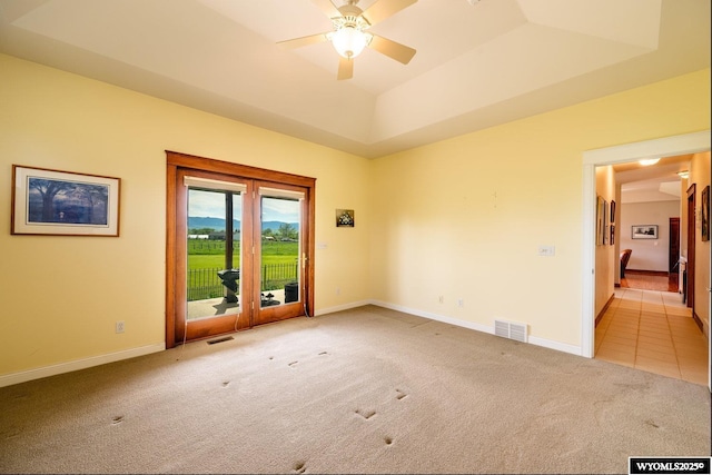 22 Pleasant Valley Ln, Sheridan, WY 82801 - spare room featuring light colored carpet, baseboards, and a ceiling fan