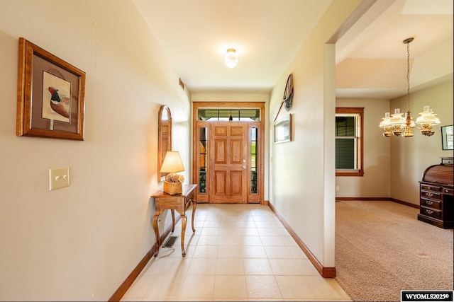 22 Pleasant Valley Ln, Sheridan, WY 82801 - foyer featuring baseboards, a chandelier, and light tile patterned floors