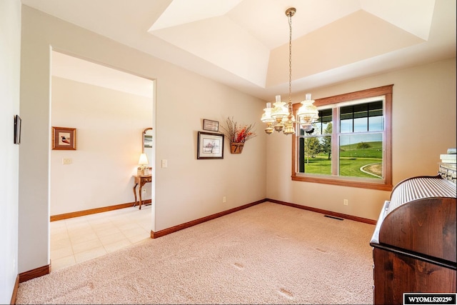 22 Pleasant Valley Ln, Sheridan, WY 82801 - unfurnished dining area featuring carpet flooring, a chandelier, a raised ceiling, and baseboards