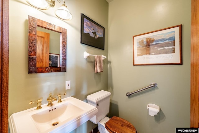 22 Pleasant Valley Ln, Sheridan, WY 82801 - bathroom featuring toilet and a sink