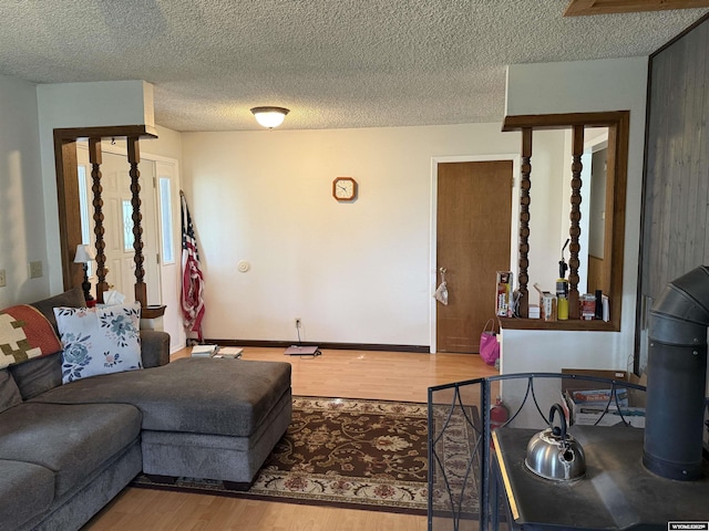 83 Calvert Ave, Hanna, WY 82327 - living room featuring wood finished floors and a textured ceiling