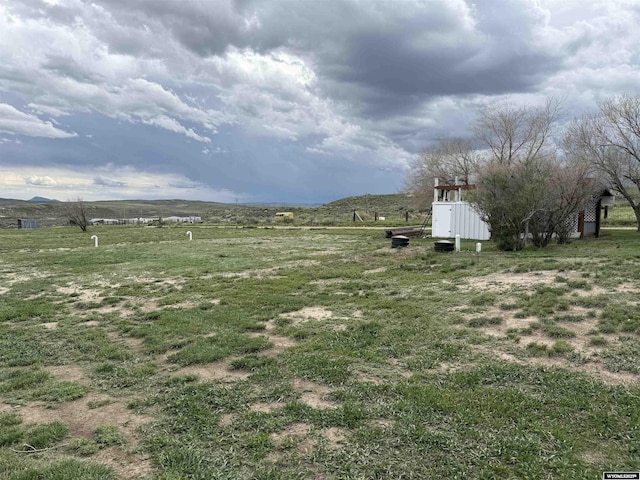 83 Calvert Ave, Hanna, WY 82327 - view of yard featuring a view of rural / pastoral area