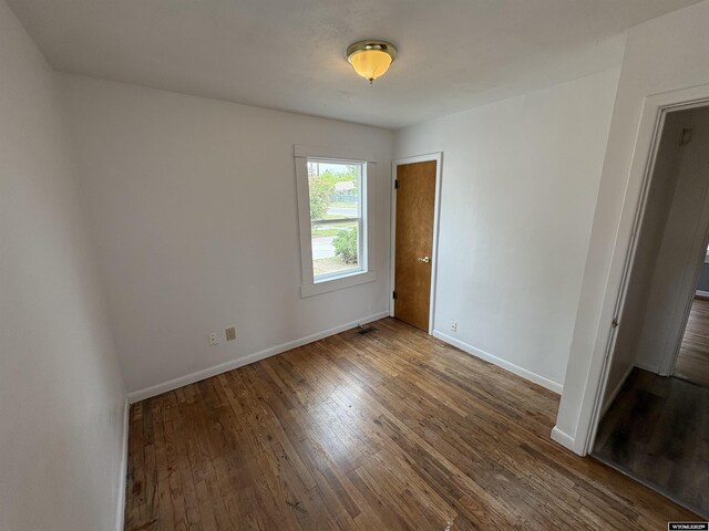 420 S 6th St, Riverton, WY 82501 - unfurnished room with hardwood / wood-style flooring and baseboards