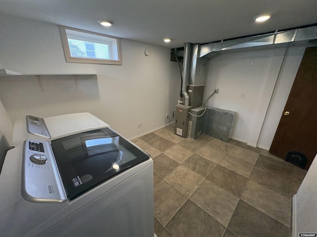 420 S 6th St, Riverton, WY 82501 - washroom with washer / clothes dryer and heating unit