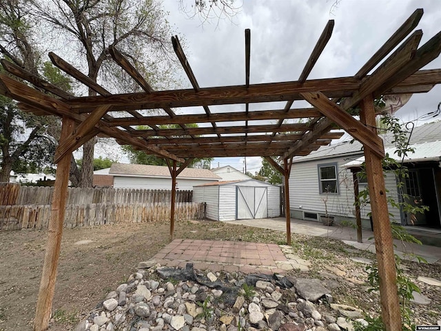 420 S 6th St, Riverton, WY 82501 - fenced backyard with a patio and a pergola