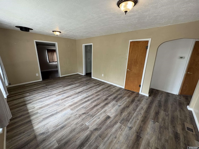 420 S 6th St, Riverton, WY 82501 - unfurnished bedroom featuring a textured ceiling, wood finished floors, and baseboards