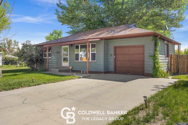 407 S Huber, Casper, WY 82609 - view of front facade with a garage and driveway