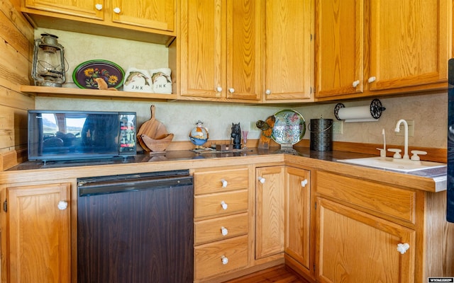 30 Nielsen Trl, Cody, WY 82414 - kitchen with a sink, backsplash, dishwashing machine, black microwave, and open shelves