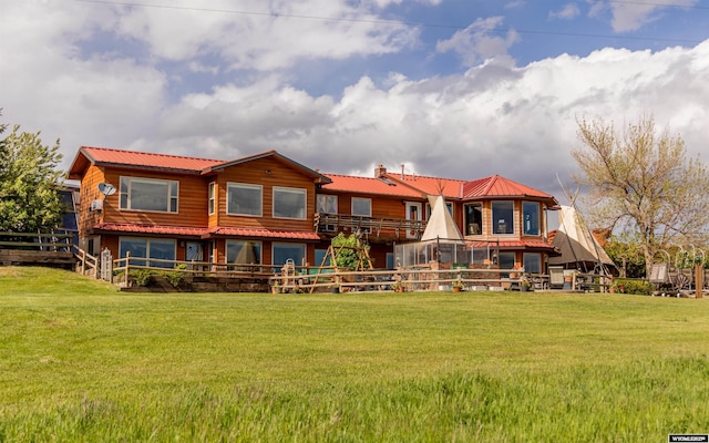 30 Nielsen Trl, Cody, WY 82414 - rear view of house featuring metal roof and a chimney