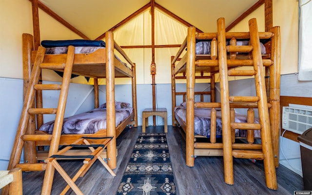 30 Nielsen Trl, Cody, WY 82414 - bedroom with wood finished floors and vaulted ceiling