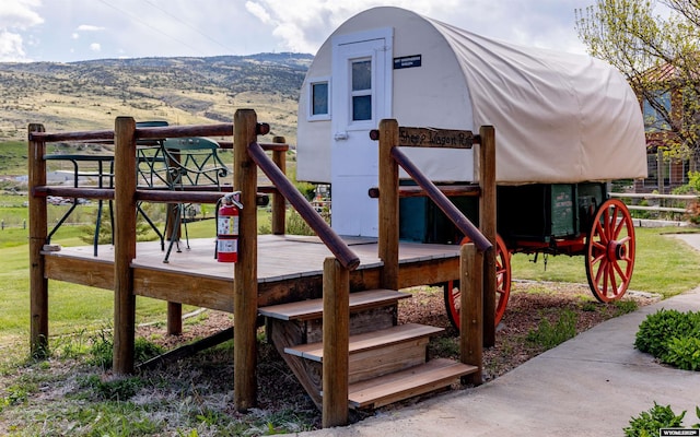 30 Nielsen Trl, Cody, WY 82414 - view of jungle gym featuring a mountain view