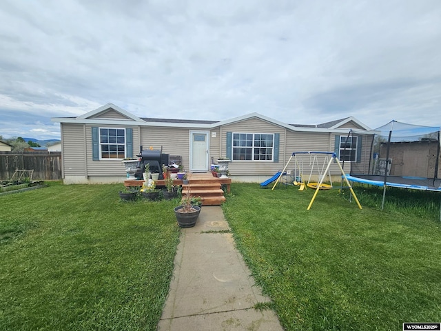 212 Vero Ln, Buffalo, WY 82834 - view of front of house featuring a trampoline and a playground
