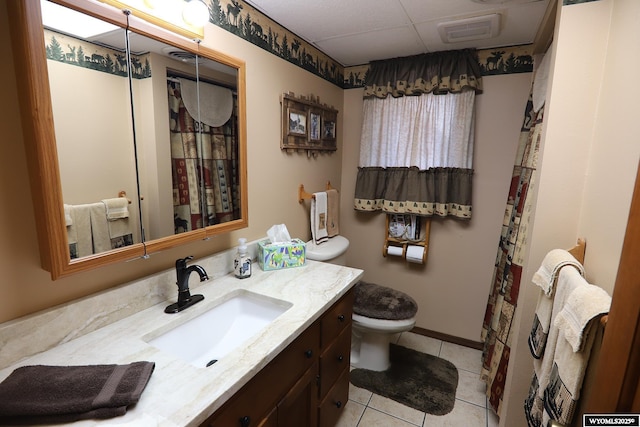 478 Upper French Creek Rd, Buffalo, WY 82834 - bathroom featuring toilet, tile patterned flooring, vanity, and baseboards