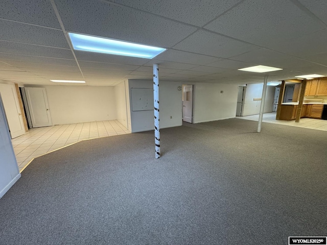 402 S 7th St E, Riverton, WY 82501 - finished basement with a paneled ceiling and light colored carpet