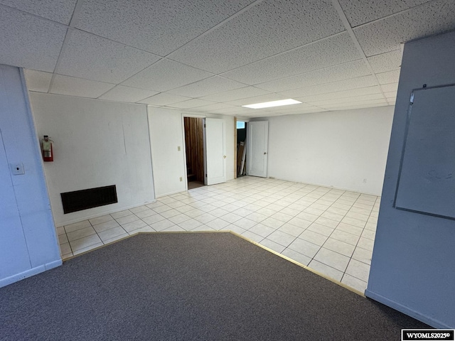 402 S 7th St E, Riverton, WY 82501 - empty room featuring a drop ceiling and tile patterned flooring
