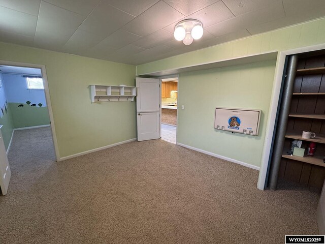 402 S 7th St E, Riverton, WY 82501 - carpeted empty room with baseboards