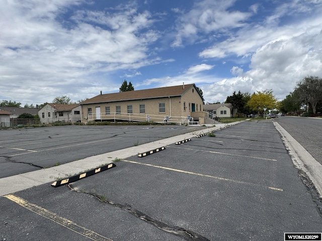 402 S 7th St E, Riverton, WY 82501 - uncovered parking lot with a residential view