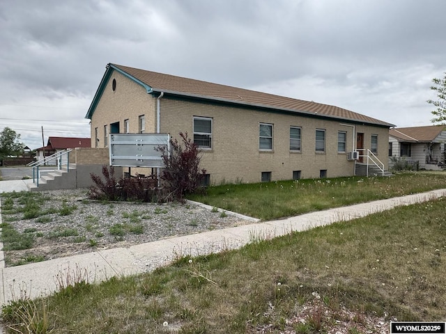 402 S 7th St E, Riverton, WY 82501 - view of property exterior featuring brick siding