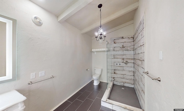 737 Cascade St, Lander, WY 82520 - bathroom featuring toilet, beamed ceiling, a tile shower, a chandelier, and baseboards