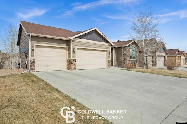 972 Cornwall St, Casper, WY 82609 - ranch-style home featuring stone siding, a garage, concrete driveway, and roof with shingles