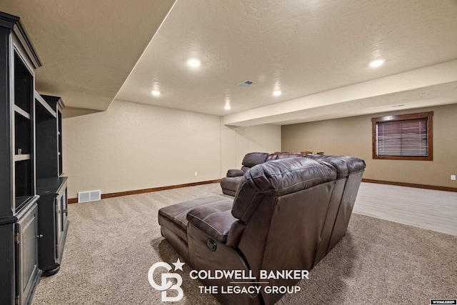 972 Cornwall St, Casper, WY 82609 - home theater room featuring light colored carpet, baseboards, and recessed lighting