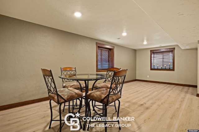 972 Cornwall St, Casper, WY 82609 - dining room with light wood-type flooring, baseboards, a textured wall, and recessed lighting
