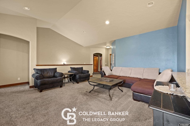 972 Cornwall St, Casper, WY 82609 - living room with arched walkways, vaulted ceiling, carpet, recessed lighting, and baseboards