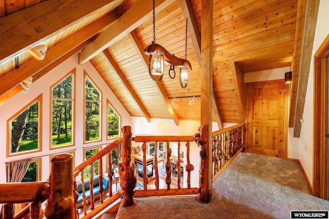 43 Fish Hatchery Rd, Story, WY 82842 - hall featuring wood ceiling, carpet, and an upstairs landing