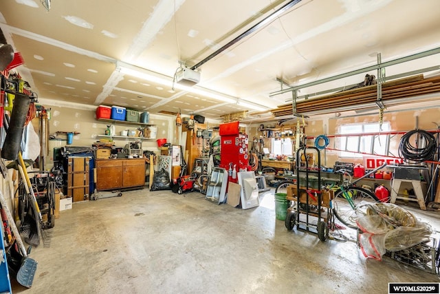 43 Fish Hatchery Rd, Story, WY 82842 - garage featuring a workshop area and a garage door opener