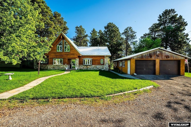 43 Fish Hatchery Rd, Story, WY 82842 - log-style house with stone siding, a garage, and a front lawn