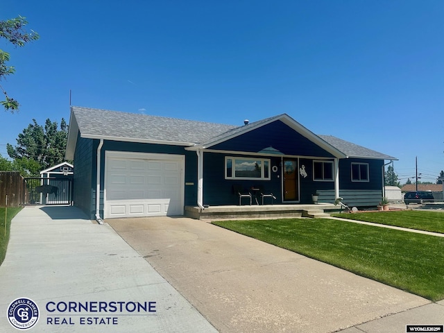 3024 Hamilton Way, Casper, WY 82609 - ranch-style home with concrete driveway, a garage, a porch, a gate, and roof with shingles
