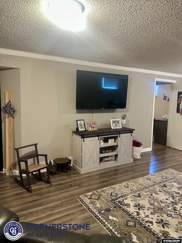3024 Hamilton Way, Casper, WY 82609 - living room featuring a textured ceiling, dark wood-type flooring, and baseboards