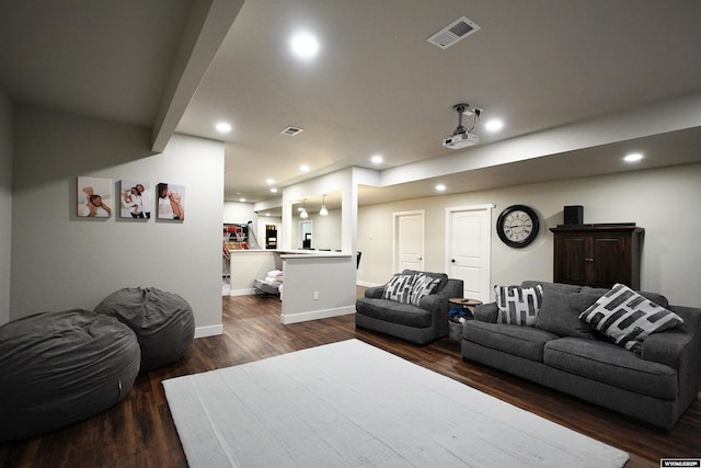 3685 Timber Wolf Ct, Casper, WY 82604 - living room featuring dark wood-style floors, recessed lighting, and baseboards