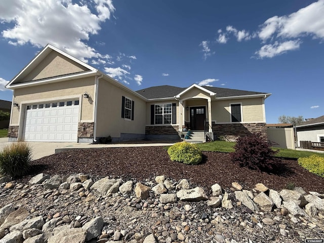 1765 New Mexico St, Green River, WY 82935 - single story home featuring stone siding, stucco siding, concrete driveway, and an attached garage