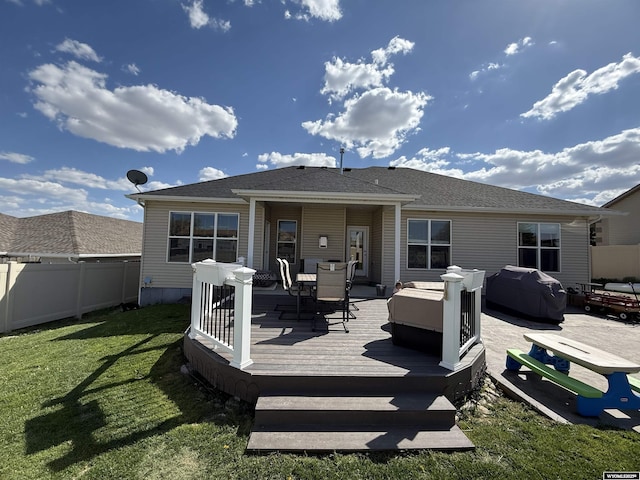 1765 New Mexico St, Green River, WY 82935 - rear view of house featuring a wooden deck, outdoor dining area, and roof with shingles