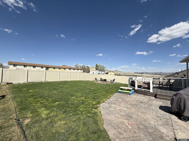 1765 New Mexico St, Green River, WY 82935 - view of yard with a wooden deck and a patio area