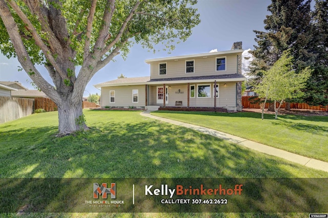 5411 S Oak St, Casper, WY 82601 - view of front of home with a porch and a chimney